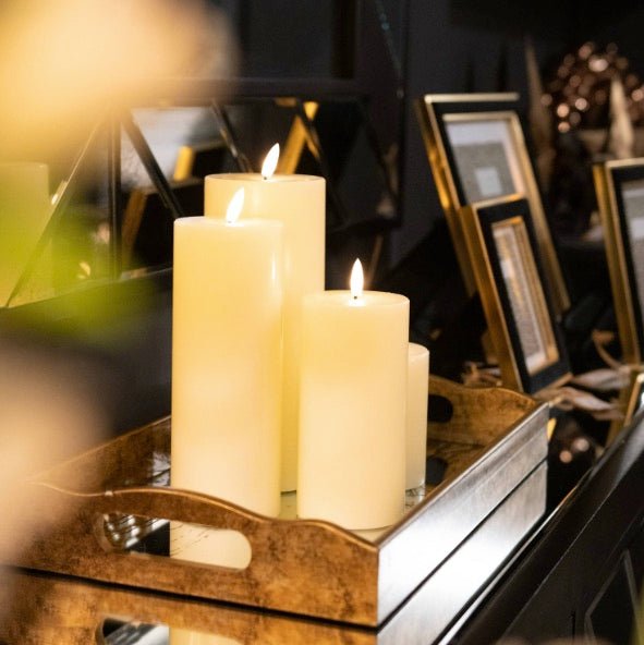 Varying size LED Candles on decorative tray