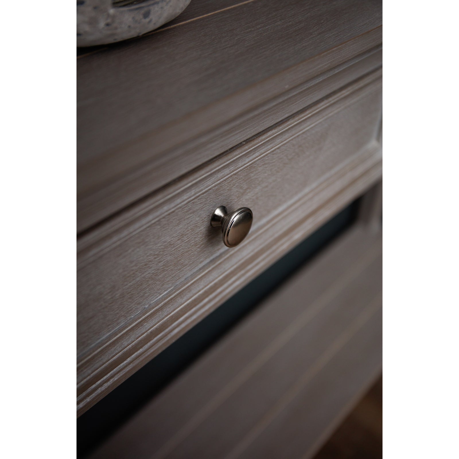 close up of drawer on two drawer console table