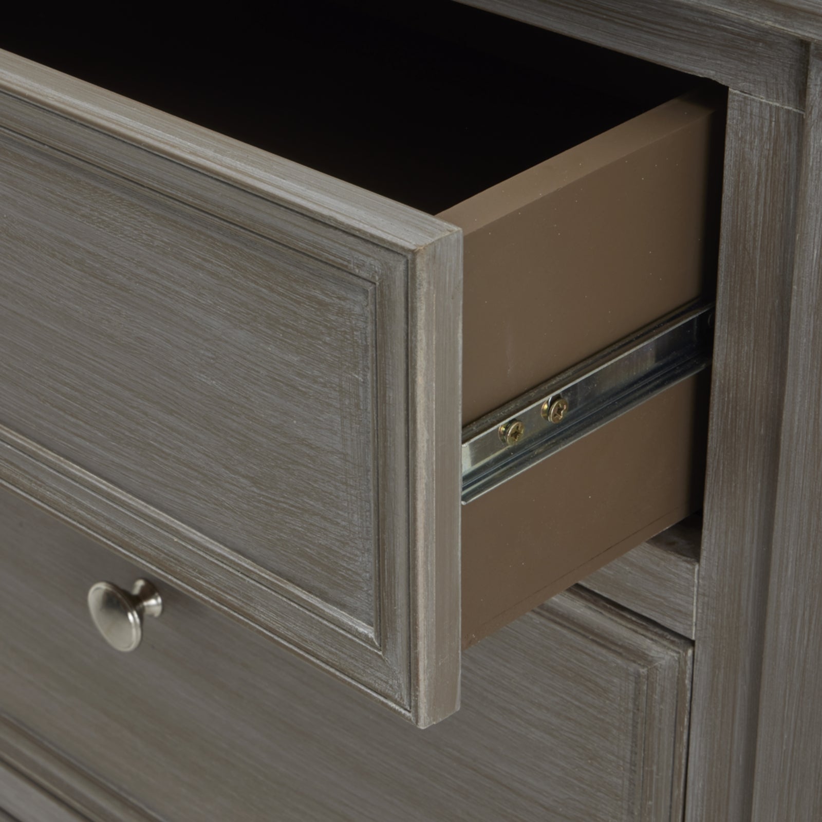 open drawer on the 2 over 2 chest of drawers