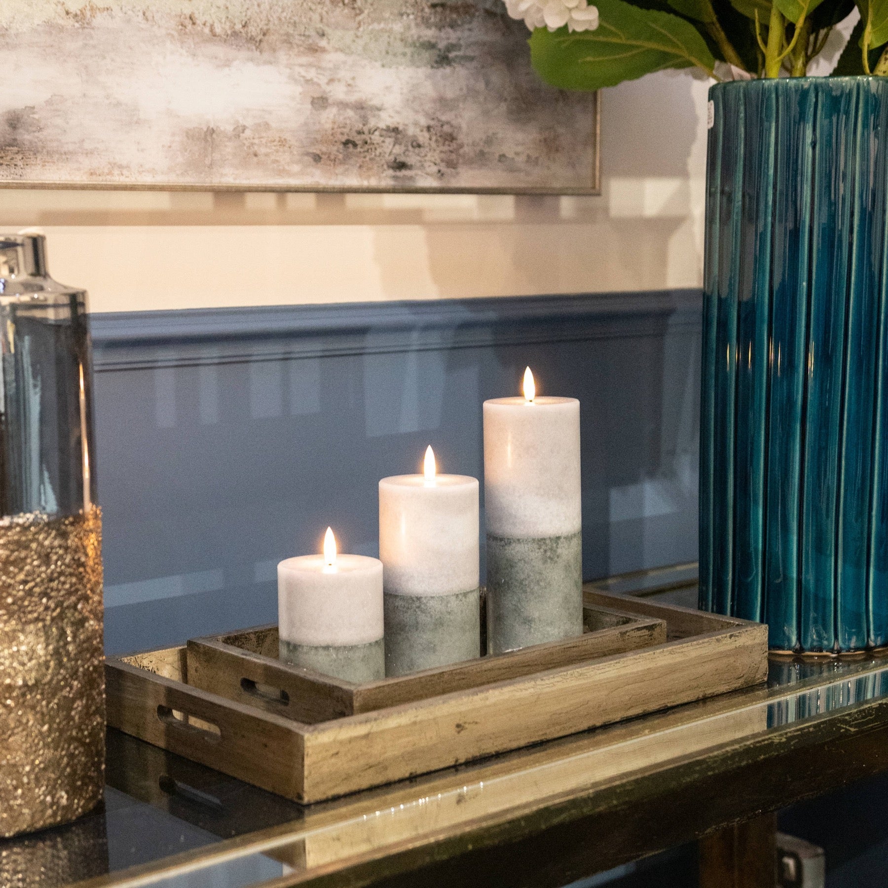 three sizes of two tone LED candles on decorative tray