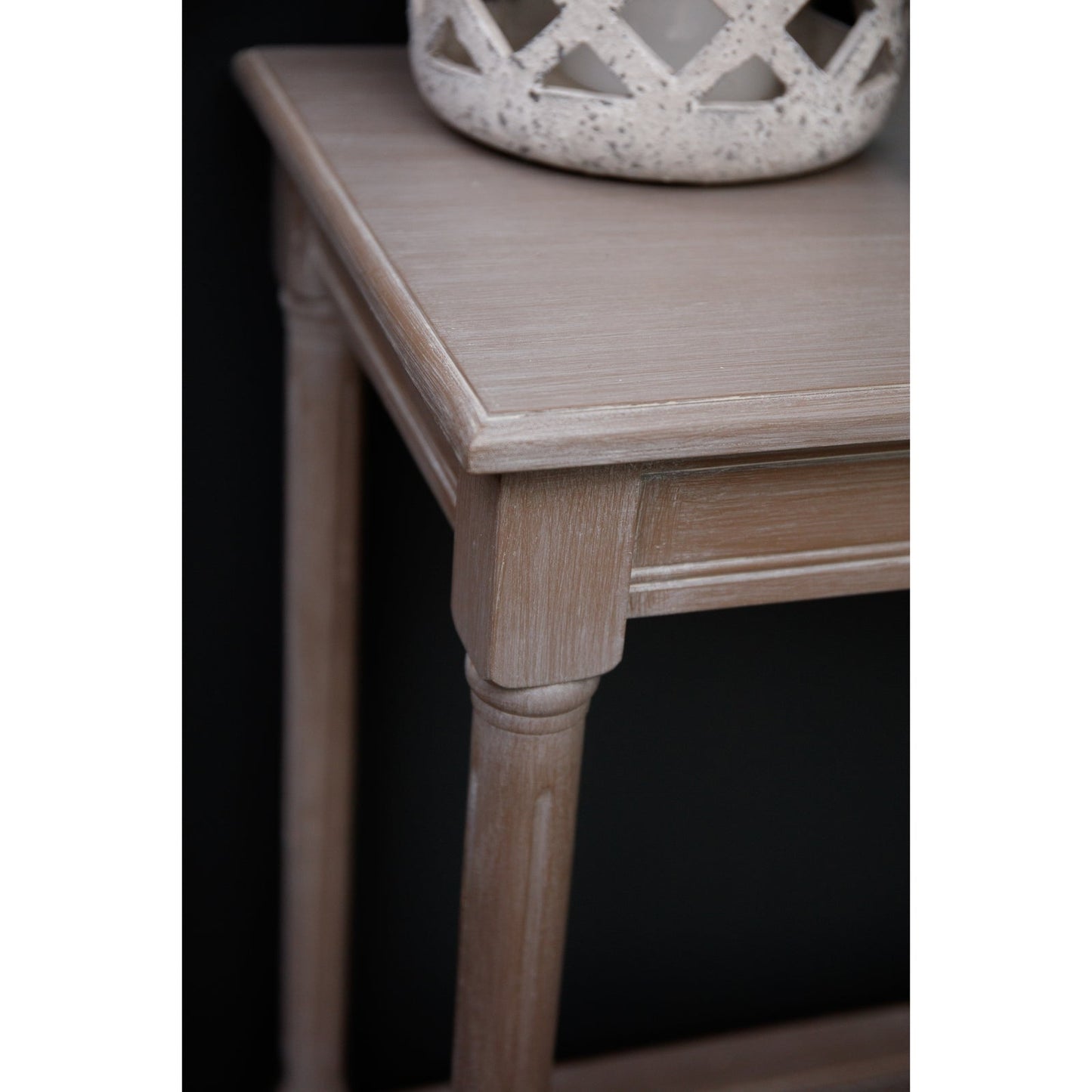 Top corner detail of large console table