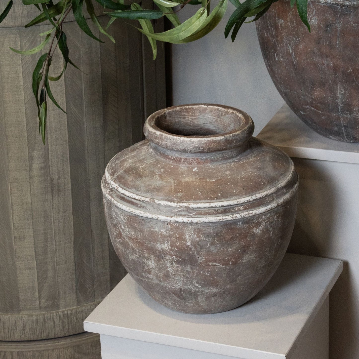 full image of small rustic water pot vase