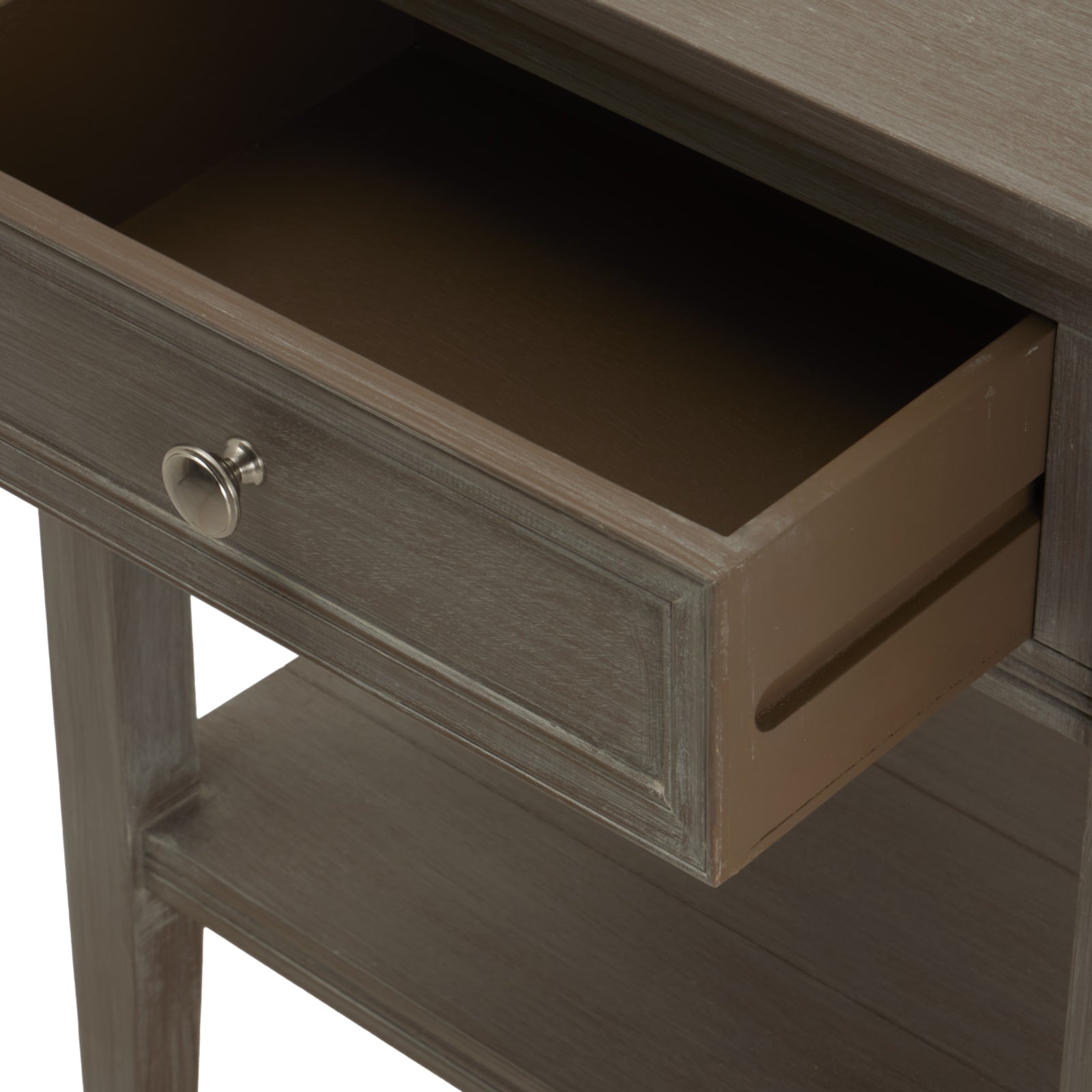 open drawer of small side table