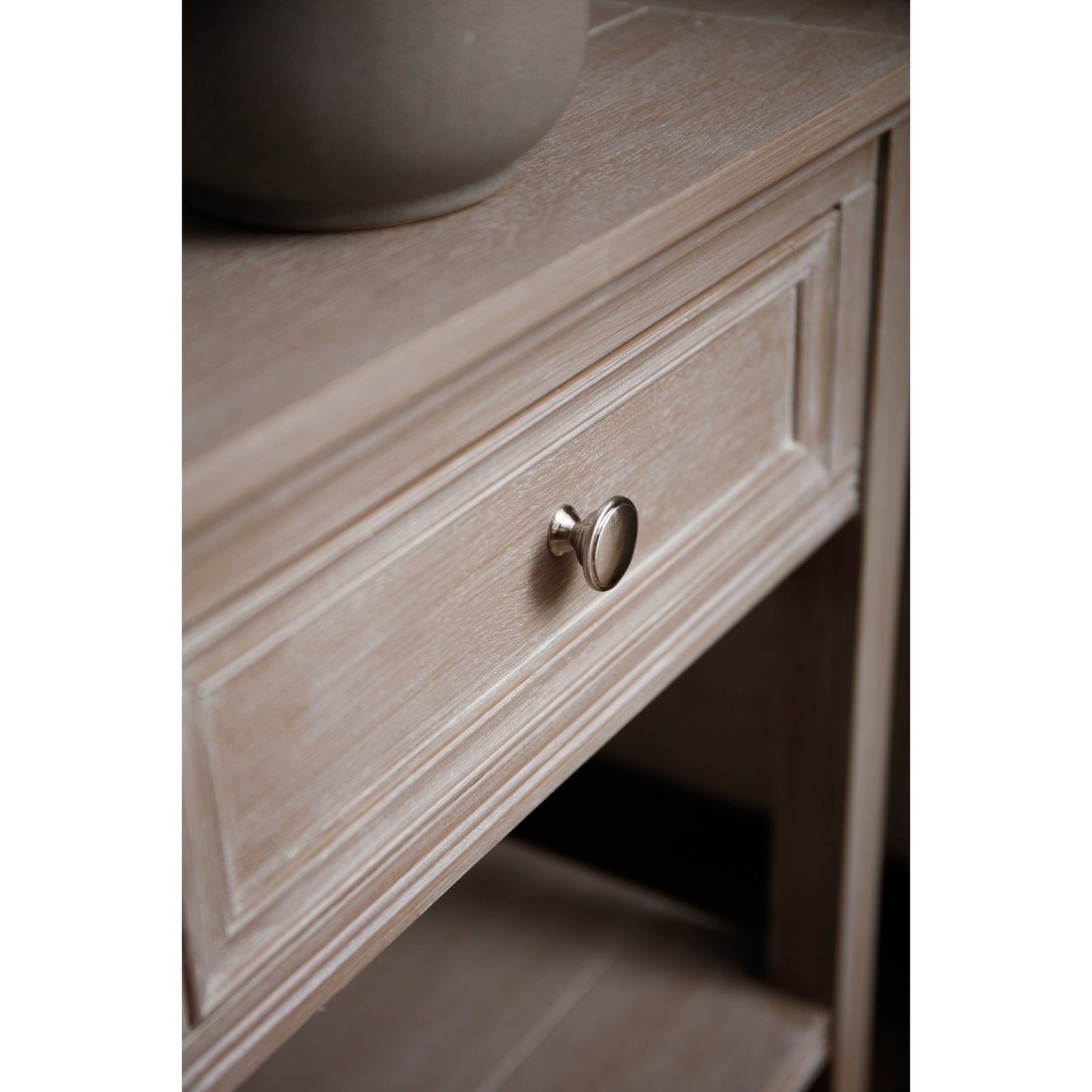 closed drawer of small side table