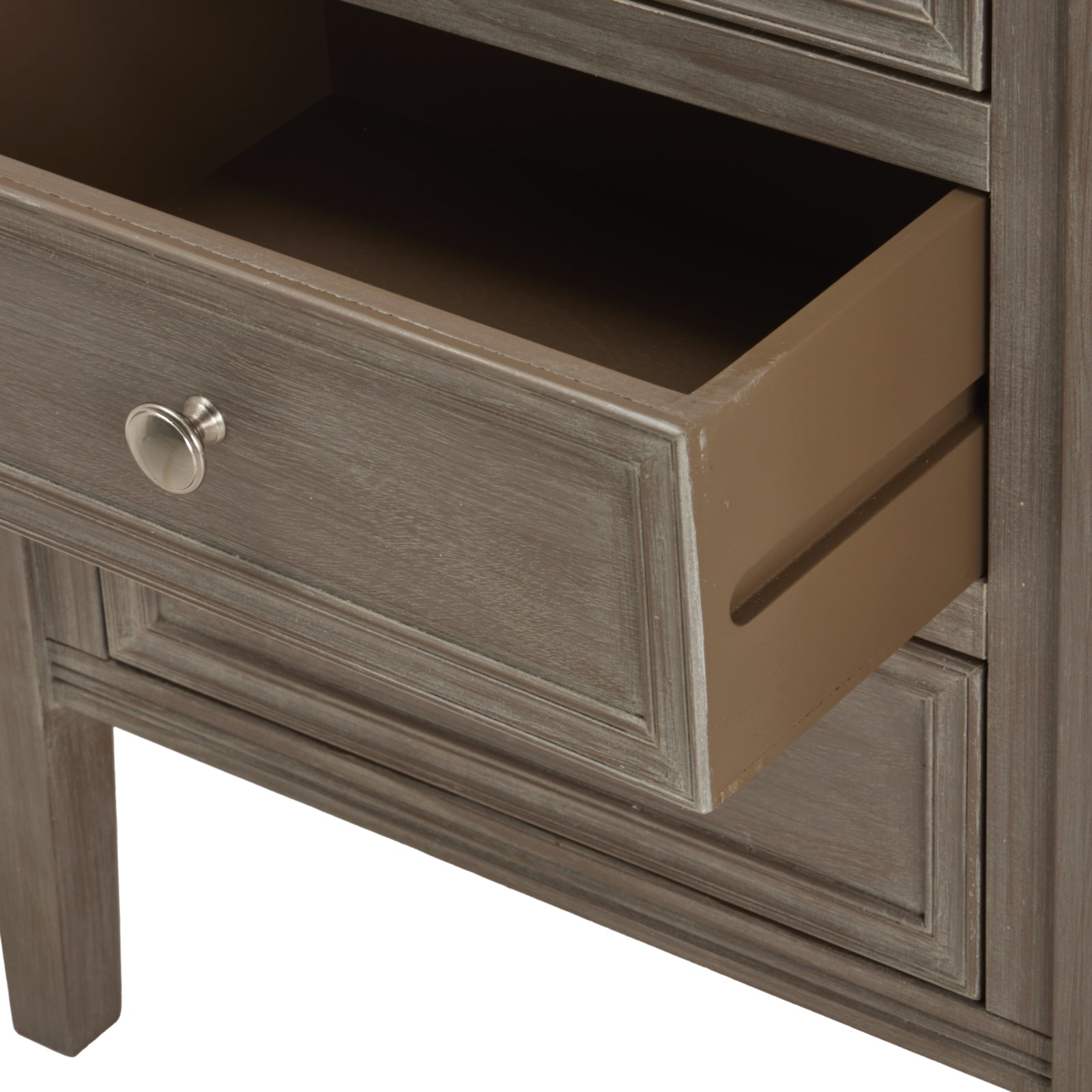 open drawer of wood bedside table