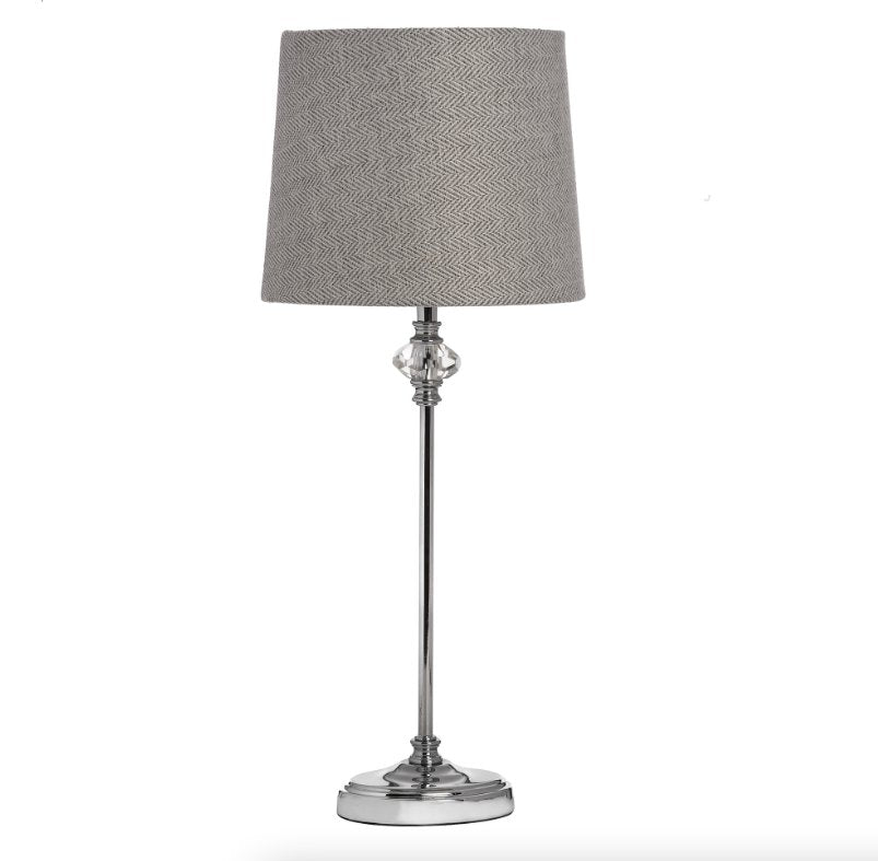 Borgo slim chrome lamp with cut glass detail to the top of the stem. Herringbone grey Lampshade