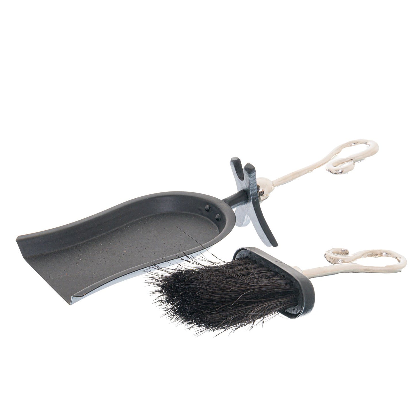 Chrome crook handle hearth tidy set, with the brush laid next to the shovel