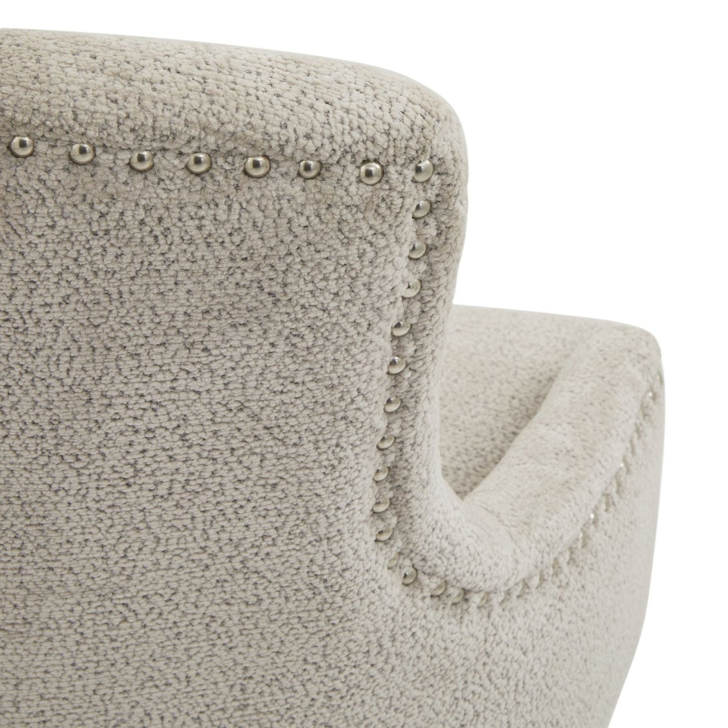 close up of the curved back detailing and studding on the back of the headley dining chair