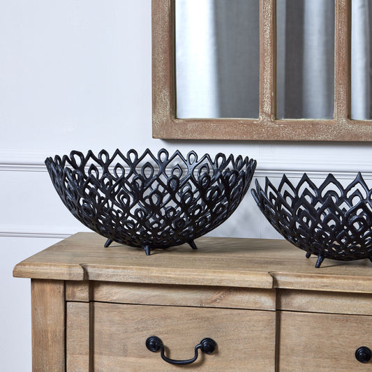 Large and Small bowl on sideboard with mirror behind