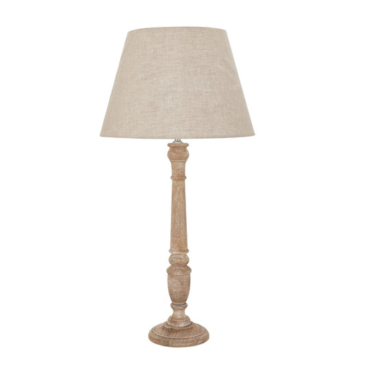 full length of natural wash spindle lamp with linen shade