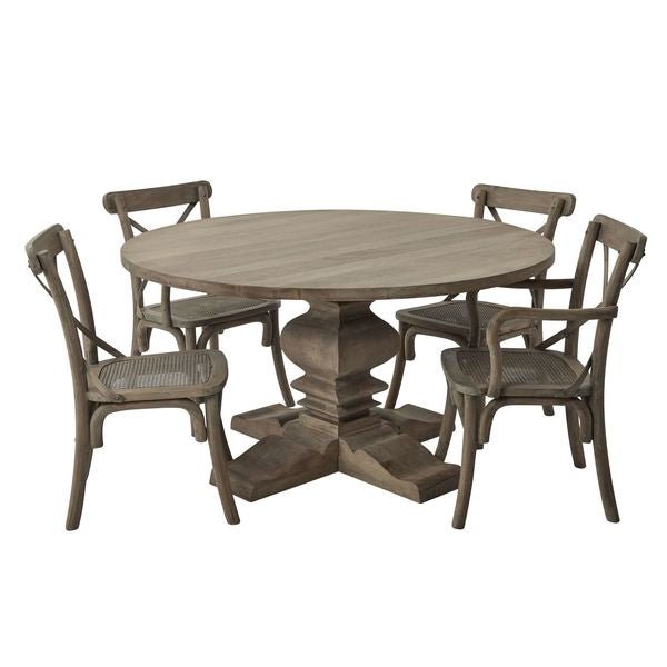 round dining table set up with carver style dining chairs