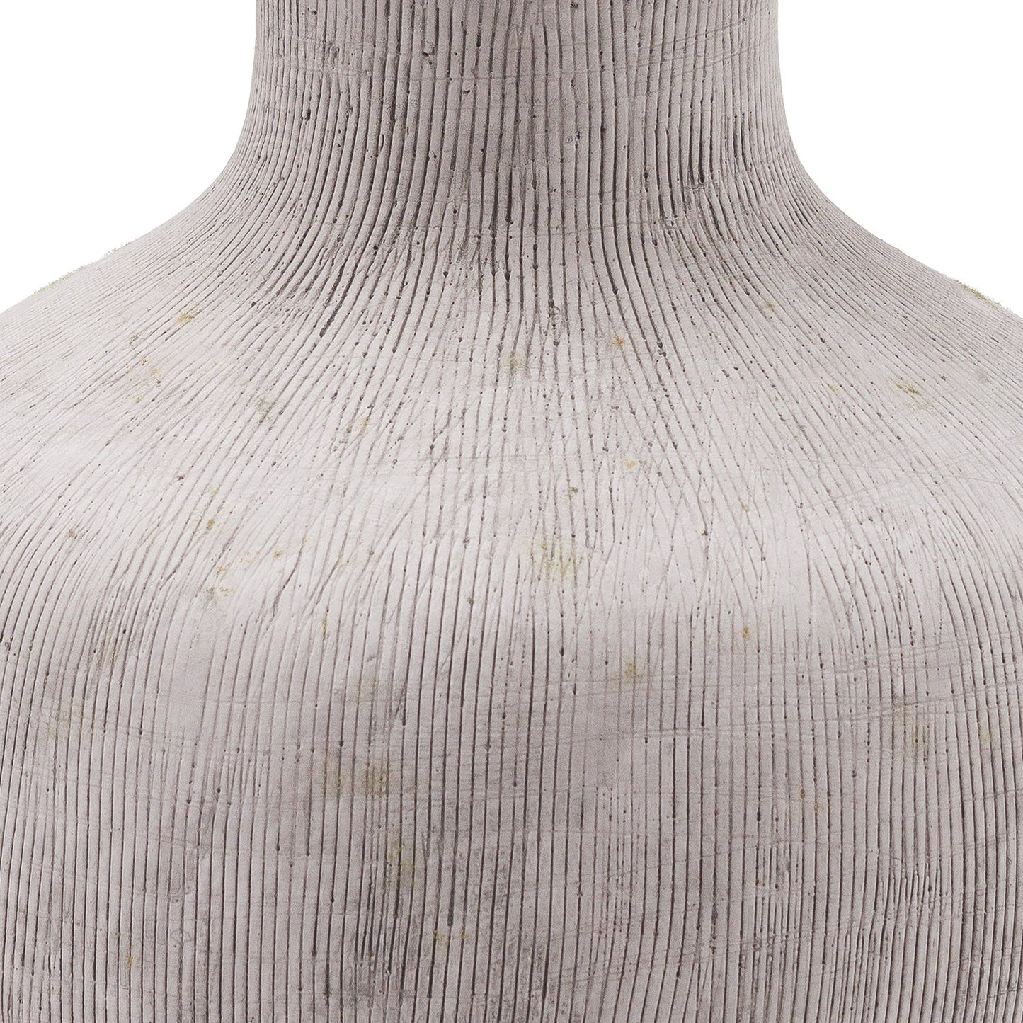 close up of the vertical lines that add texture to the squat stone vase