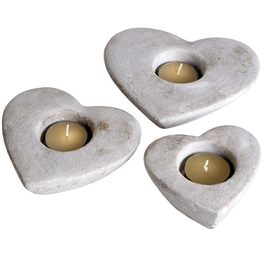 set of three stone heart tealight holders with tealights in